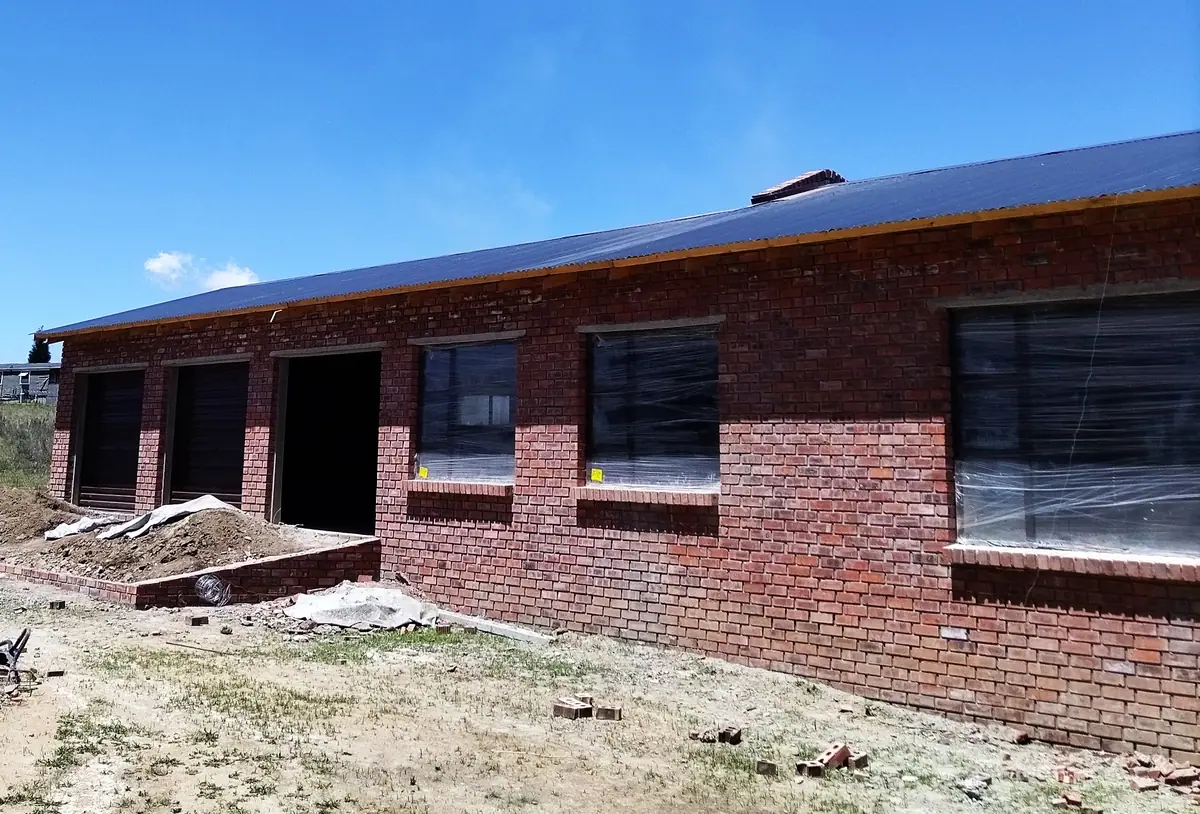 The finished shell of a new face-brick home