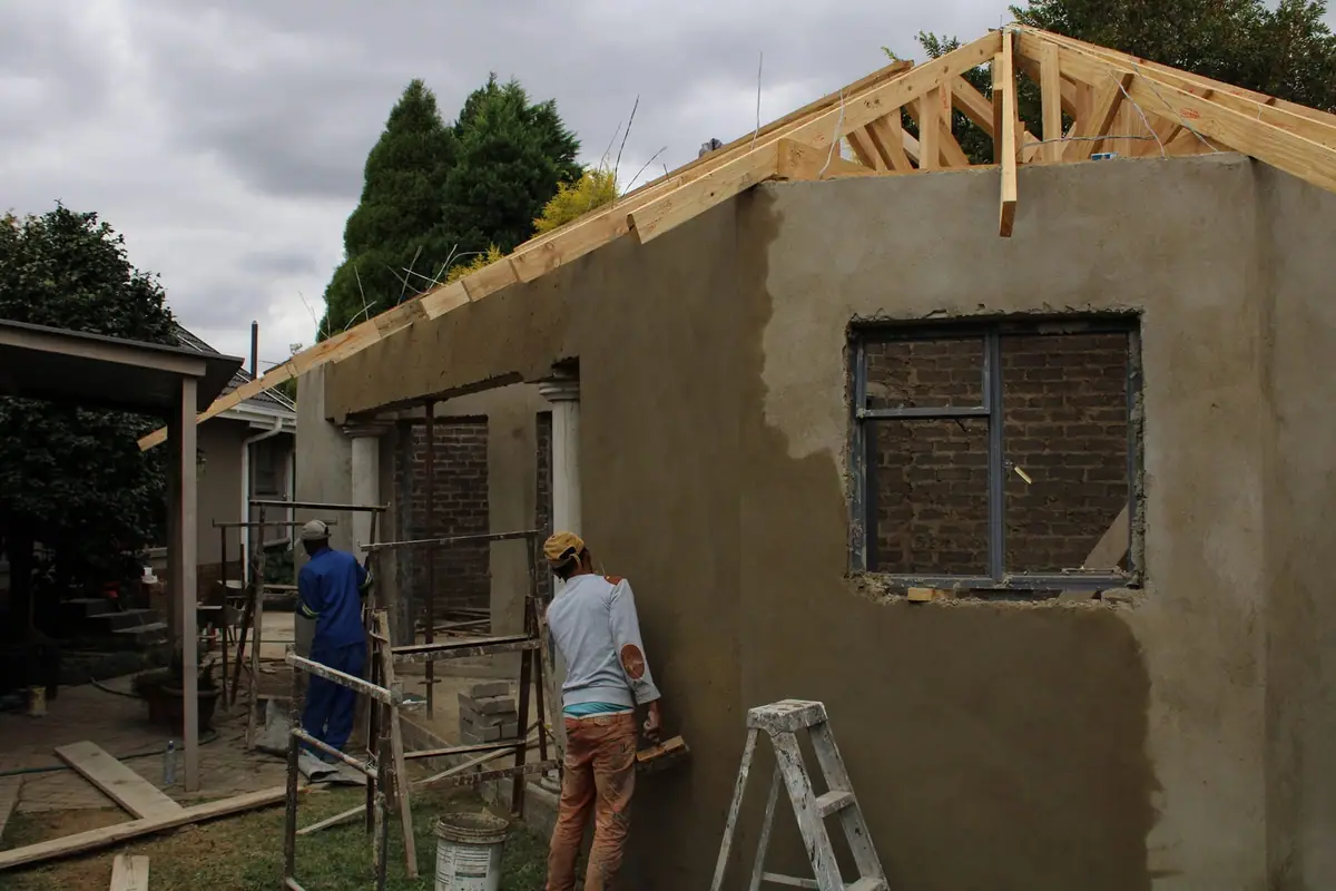 Room addition with a tiled roof by Ri-Han Construction, photo 2