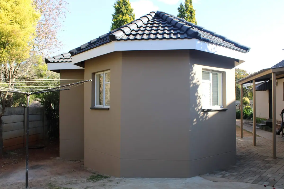 Room addition with a tiled roof by Ri-Han Construction, photo 7