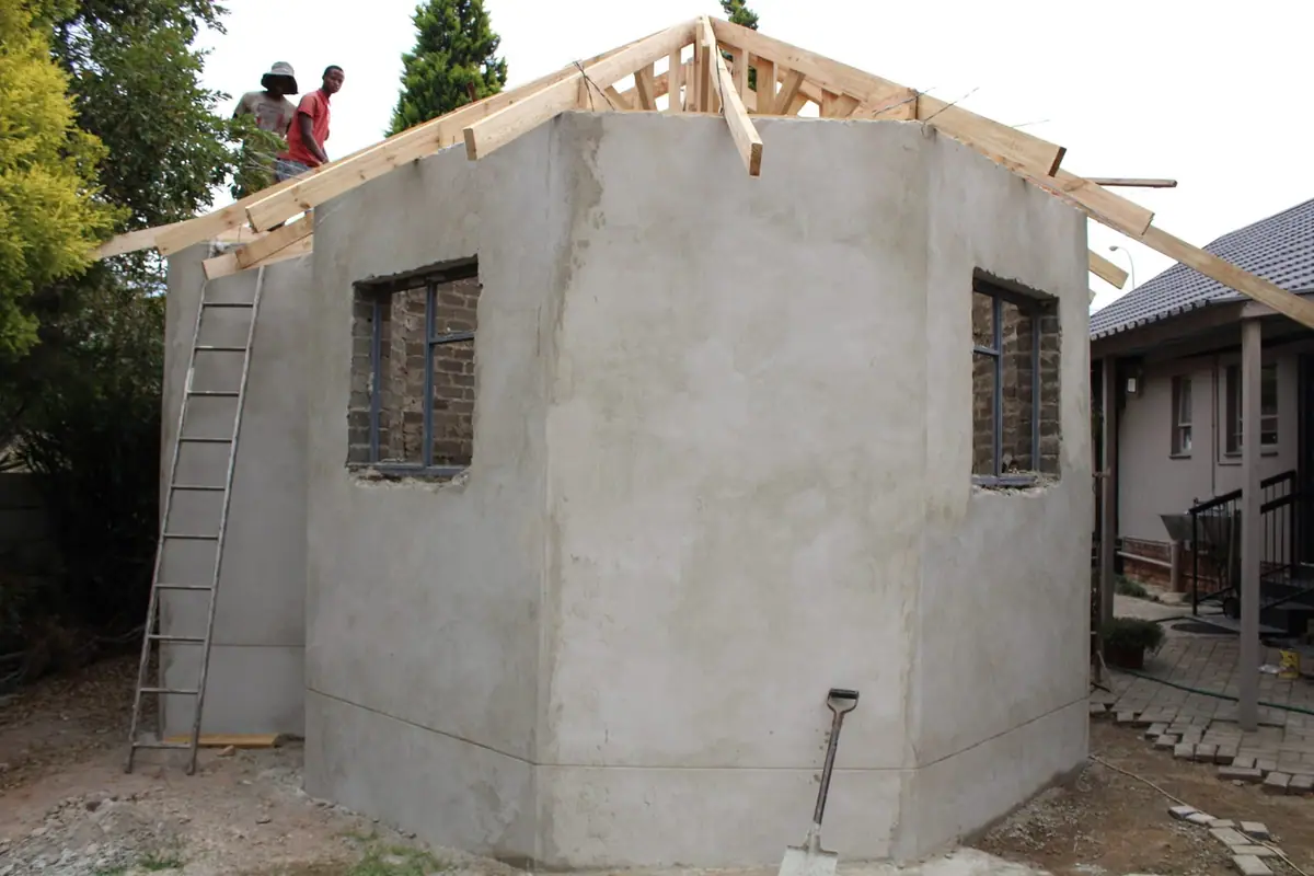 Room addition with a tiled roof by Ri-Han Construction, photo 3